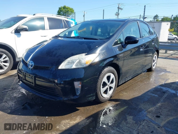 2013 Toyota Prius One with VIN JTDKN3DU5D1721701, listed as a IAAI auction lot 42039097 with 167,497 mi miles and . Bid and sale history available at DreamBid. Image 2.