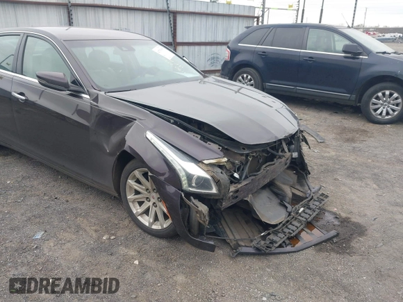 2014 Cadillac CTS Luxury RWD z VIN 1G6AR5S3XE0192441, wystawiony jako IAAI lot #41707095 z przebiegiem 205 904 mil mil oraz . Historia ofert i sprzedaży dostępna na DreamBid. Obrazek 6.