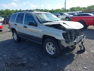 2004 Jeep Grand Cherokee Laredo z VIN 1J8GW48S84C245958, wystawiony jako IAAI lot #42291843 z przebiegiem 258 712 mil mil oraz . Historia ofert i sprzedaży dostępna na DreamBid. Obrazek 1.