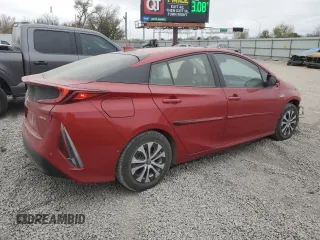 2022 Toyota Prius LE z VIN JTDKAMFP5N3213162, wystawiony jako Copart lot #82551774 z przebiegiem 55 173 mil mil oraz Szkoda całkowita • Salvage title. Historia ofert i sprzedaży dostępna na DreamBid. Obrazek 3.