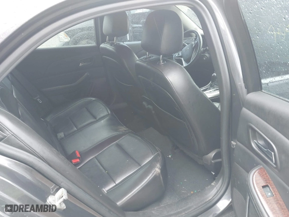 2013 Chevrolet Malibu LTZ with VIN 1G11H5SA1DF286288, listed as a IAAI auction lot 40457277 with 216,703 mi miles. Bid and sale history available at carsss.com. Image 8.