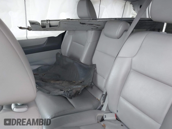 2014 Honda Odyssey Touring with VIN 5FNRL5H97EB054158, listed as a IAAI auction lot 42548360 with 91,161 mi miles and . Bid and sale history available at DreamBid. Image 8.