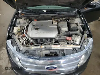 2012 Ford Fusion Hybrid с VIN 3FADP0L33CR231536, выставлен на аукционе Copart как лот 55330545 с пробегом 165 481 миль миль и Списание • Salvage title. История ставок и продаж доступна на DreamBid. Изображение 11.