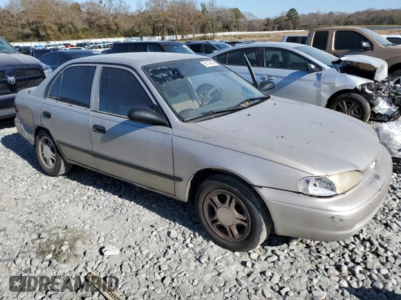 2000 Chevrolet Prizm z VIN 1Y1SK5284YZ407566, wystawiony jako Copart lot #86148464 z przebiegiem 193 844 mil mil oraz Szkoda całkowita • Salvage title. Historia ofert i sprzedaży dostępna na DreamBid. Obrazek 4.