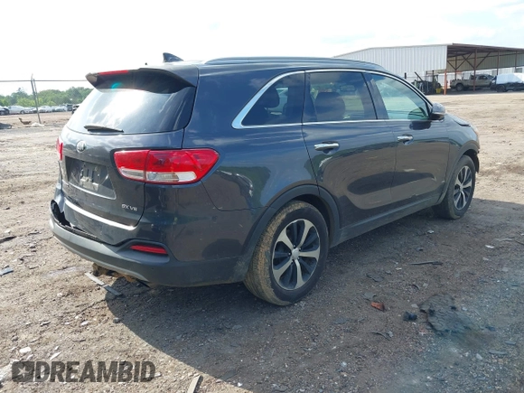 2016 Kia Sorento EX with VIN 5XYPHDA5XGG083093, listed as a IAAI auction lot 42138707 with 156,799 mi miles and . Bid and sale history available at DreamBid. Image 4.