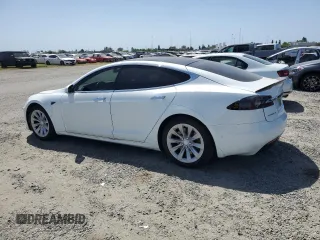 2018 Tesla Model S 75D with VIN 5YJSA1E29JF281143, listed as a Copart auction lot 54208145 with 132,722 mi miles and Salvage title. Bid and sale history available at DreamBid. Image 2.