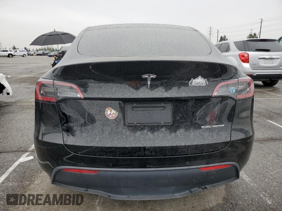 2021 Tesla Model Y Long Range with VIN 5YJYGDEEXMF294556, listed as a Copart auction lot 46668035 with 42,772 mi miles and Salvage Title. Bid and sale history available at DreamBid. Image 6.