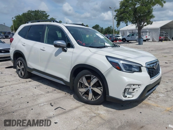 2021 Subaru Forester Touring with VIN JF2SKAXC8MH574427, listed as a IAAI auction lot 42529701 with 11,409 mi miles and . Bid and sale history available at DreamBid. Image 1.