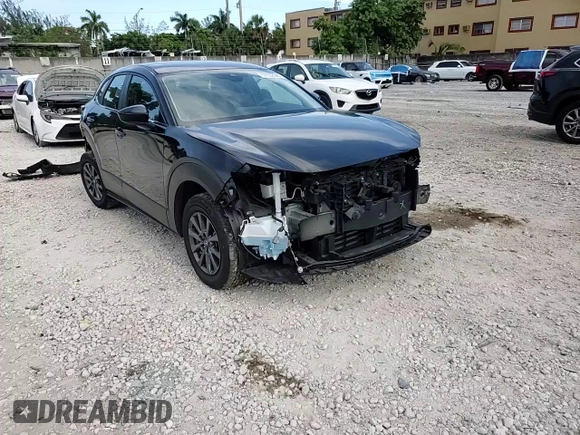 2023 Mazda CX-30 S z VIN 3MVDMBAM1PM537694, wystawiony jako Copart lot #57892645 z przebiegiem 28 733 mil mil oraz Szkoda całkowita • Salvage title. Historia ofert i sprzedaży dostępna na DreamBid. Obrazek 14.
