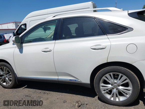 2013 Lexus RX 450h with VIN JTJBC1BA2D2060753, listed as a IAAI auction lot 42399012 with Not provided miles and . Bid and sale history available at DreamBid. Image 14.