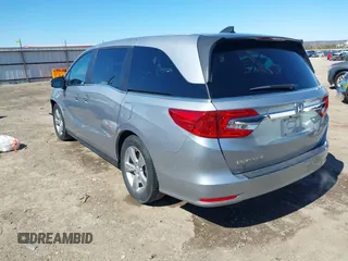 2018 Honda Odyssey EX-L with VIN 5FNRL6H71JB077112, listed as a IAAI auction lot 41721523 with 70,893 mi miles. Bid and sale history available at carsss.com. Image 3.