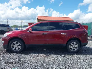 2015 Chevrolet Traverse LT z VIN 1GNKVHKD9FJ373749, wystawiony jako IAAI lot #42291335 z przebiegiem 136 558 mil mil oraz . Historia ofert i sprzedaży dostępna na DreamBid. Obrazek 14.