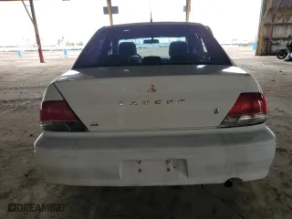 2002 Mitsubishi Lancer ES with VIN JA3AJ26E22U029638, listed as a Copart auction lot 49445635 with 304,063 mi miles and Salvage Title. Bid and sale history available at carsss.com. Image 6.