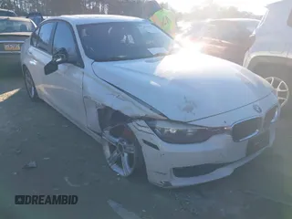 2014 BMW 3 Series 328i with VIN WBA3C1C58EK109865, listed as a IAAI auction lot 41290811 with 146,258 mi miles. Bid and sale history available at carsss.com. Image 1.
