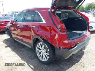 2019 Cadillac XT4 FWD Premium Luxury with VIN 1GYFZCR49KF207634, listed as a IAAI auction lot 42256021 with 67,481 mi miles and . Bid and sale history available at DreamBid. Image 3.