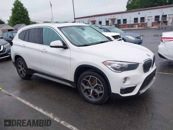 2019 BMW X1 xDrive28i with VIN WBXHT3C54K3H35641, listed as a IAAI auction lot 42241894 with 100,989 mi miles and . Bid and sale history available at DreamBid. Image 13.
