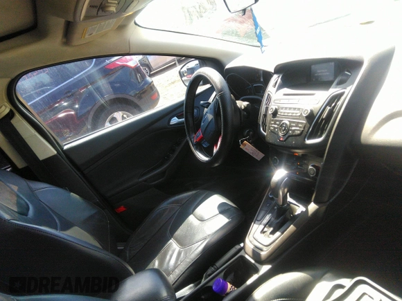 2016 Ford Focus SE with VIN 1FADP3F26GL251482, listed as a IAAI auction lot 41891466 with 111,277 mi miles. Bid and sale history available at carsss.com. Image 5.