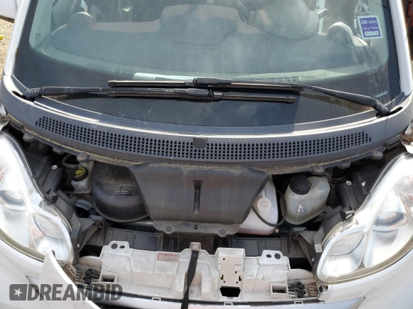 2015 Smart fortwo Passion z VIN WMEEJ3BA8FK800733, wystawiony jako Copart lot #57268944 z przebiegiem Nie podano mil oraz Szkoda całkowita • Salvage title. Historia ofert i sprzedaży dostępna na DreamBid. Obrazek 11.