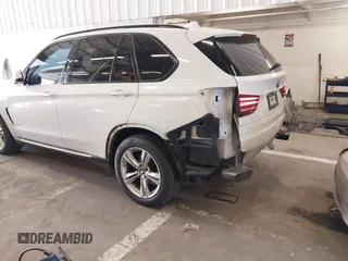 2015 BMW X5 xDrive50i z VIN 5UXKR6C56F0J76986, wystawiony jako IAAI lot #42079106 z przebiegiem 96 220 mil mil oraz . Historia ofert i sprzedaży dostępna na DreamBid. Obrazek 6.