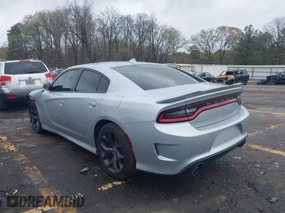 2019 Dodge Charger R/T with VIN 2C3CDXCTXKH757197, listed as a IAAI auction lot 41860544 with 98,820 mi miles and . Bid and sale history available at DreamBid. Image 3.