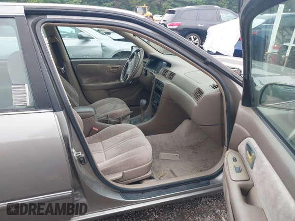 1998 Toyota Camry LE z VIN 4T1BG22KXWU202064, wystawiony jako IAAI lot #42294073 z przebiegiem 245 032 mil mil oraz . Historia ofert i sprzedaży dostępna na DreamBid. Obrazek 5.
