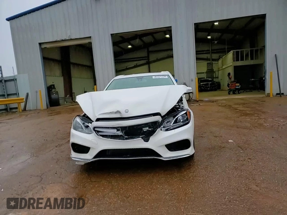 2014 Mercedes-Benz E 400 Sport with VIN WDDHF9FBXEA936424, listed as a Copart auction lot 83331224 with 194,689 mi miles and Salvage Title. Bid and sale history available at DreamBid. Image 11.
