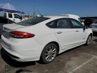 2017 Ford Fusion Hybrid SE z VIN 3FA6P0LU2HR209228, wystawiony jako Copart lot #62518055 z przebiegiem 119 174 mil mil oraz Szkoda całkowita • Salvage title. Historia ofert i sprzedaży dostępna na DreamBid. Obrazek 3.