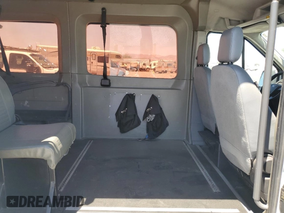 2016 Ford Transit Cargo с VIN 1FTYE1CM3GKB06921, выставлен на аукционе Copart как лот 65886415 с пробегом 147 902 миль миль и Чистый • Clean title. История ставок и продаж доступна на DreamBid. Изображение 11.