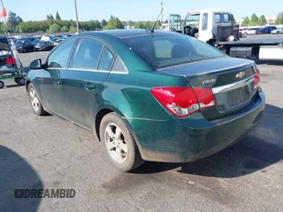 2014 Chevrolet Cruze 1LT with VIN 1G1PC5SB0E7422942, listed as a IAAI auction lot 42107523 with 137,701 mi miles and . Bid and sale history available at DreamBid. Image 3.