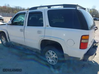 2003 Chevrolet Tahoe Z71 with VIN 1GNEK13Z63R228530, listed as a IAAI auction lot 41996750 with 220,916 mi miles. Bid and sale history available at carsss.com. Image 3.