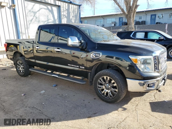 2017 Nissan Titan SL z VIN 1N6BA1F20HN522403, wystawiony jako Copart lot #87477114 z przebiegiem 98 084 mil mil oraz Szkoda całkowita • Salvage title. Historia ofert i sprzedaży dostępna na DreamBid. Obrazek 4.