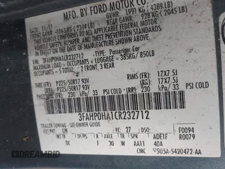 2012 Ford Fusion SE with VIN 3FAHP0HA1CR232712, listed as a IAAI auction lot 42097022 with 156,757 mi miles. Bid and sale history available at carsss.com. Image 9.