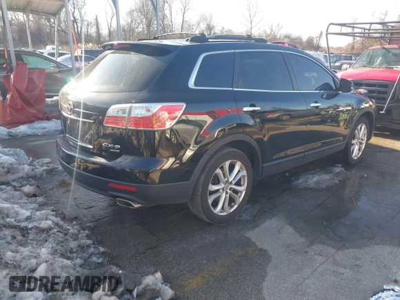 2011 Mazda CX-9 Grand Touring with VIN JM3TB3DV0B0304454, listed as a IAAI auction lot 41331484 with 221,985 mi miles. Bid and sale history available at carsss.com. Image 4.