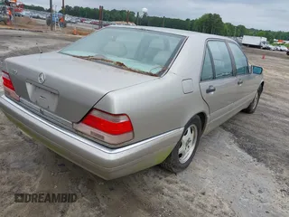 1999 Mercedes-Benz S 320/430/500 z VIN WDBGA43G3XA425985, wystawiony jako IAAI lot #42376647 z przebiegiem 217 736 mil mil oraz . Historia ofert i sprzedaży dostępna na DreamBid. Obrazek 4.
