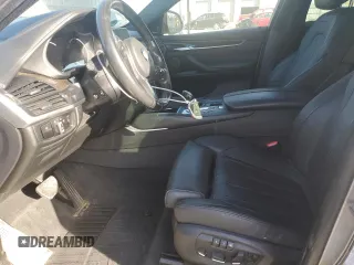 2016 BMW X6 xDrive50i with VIN 5UXKU6C57G0R33958, listed as a Copart auction lot 49774065 with 124,226 mi miles and Salvage Title. Bid and sale history available at carsss.com. Image 7.