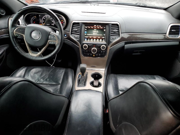 2017 Jeep Grand Cherokee Overland with VIN 1C4RJFCGXHC927470, listed as a Copart auction lot 45132185 with 119,543 mi miles and Salvage Title. Bid and sale history available at carsss.com. Image 8.