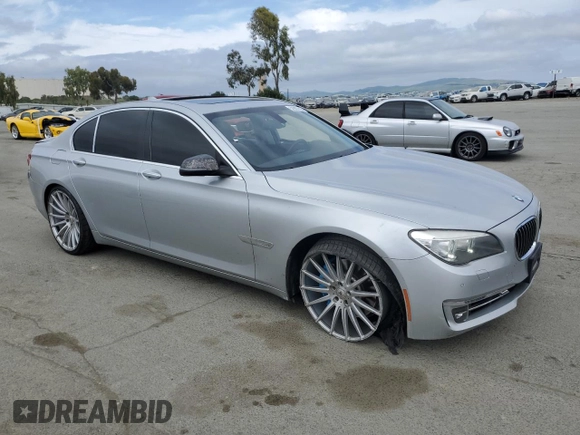 2013 BMW 7 Series 750i with VIN WBAYA8C57DC996498, listed as a Copart auction lot 52907415 with 109,405 mi miles and Salvage Title. Bid and sale history available at DreamBid. Image 4.