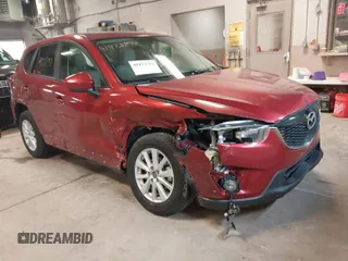 2013 Mazda CX-5 Touring with VIN JM3KE4CEXD0120913, listed as a IAAI auction lot 41973792 with 129,202 mi miles. Bid and sale history available at carsss.com. Image 1.