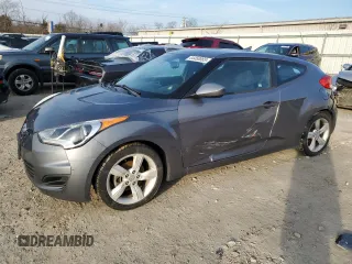 2014 Hyundai Veloster z VIN KMHTC6AD9EU204221, wystawiony jako Copart lot #44458865 z przebiegiem 121 965 mil mil oraz Czysty tytuł • Clean title. Historia ofert i sprzedaży dostępna na DreamBid. Obrazek 1.