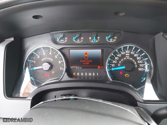 2014 Ford F-150 XL with VIN 1FTMF1CM2EFA69992, listed as a IAAI auction lot 41738432 with 107,778 mi miles. Bid and sale history available at carsss.com. Image 7.