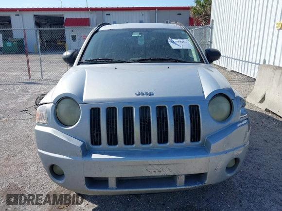 2007 Jeep Compass Sport with VIN 1J8FT47W57D185807, listed as a IAAI auction lot 41700283 with 194,339 mi miles. Bid and sale history available at carsss.com. Image 12.
