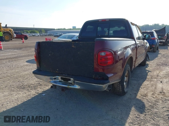 2003 Ford F-150 XLT with VIN 1FTRW07623KB56436, listed as a IAAI auction lot 42563493 with Not provided miles and . Bid and sale history available at DreamBid. Image 4.