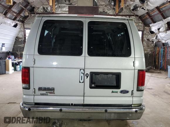 2010 Ford Econoline Passenger XL with VIN 1FBNE3BL7ADA51977, listed as a Copart auction lot 67869604 with 101,650 mi miles and Non repairable. Bid and sale history available at DreamBid. Image 6.