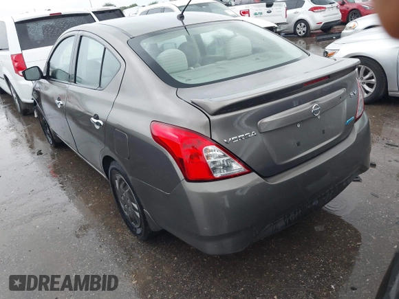 2015 Nissan Versa SV with VIN 3N1CN7AP0FL881056, listed as a IAAI auction lot 42106423 with 134,760 mi miles. Bid and sale history available at carsss.com. Image 3.