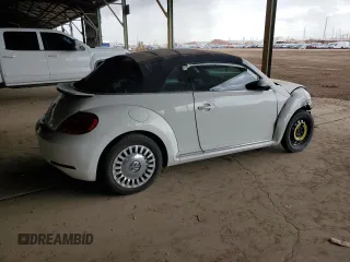 2013 Volkswagen Beetle 2.5L with VIN 3VW5P7AT2DM811768, listed as a Copart auction lot 55799135 with 60,505 mi miles and Salvage Title. Bid and sale history available at DreamBid. Image 3.
