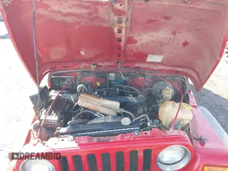 2005 Jeep Wrangler X with VIN 1J4FA39S95P385581, listed as a IAAI auction lot 41333338 with 150,010 mi miles and . Bid and sale history available at DreamBid. Image 10.