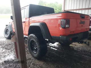 2020 Jeep Gladiator Sport S with VIN 1C6JJTAG4LL177711, listed as a IAAI auction lot 42222877 with 45,462 mi miles and . Bid and sale history available at DreamBid. Image 3.