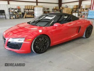 2014 Audi R8 z VIN WUASUAFG4EN001690, wystawiony jako Copart lot #76967744 z przebiegiem 63 161 mil mil oraz Szkody całkowita. Historia ofert i sprzedaży dostępna na DreamBid. Obrazek 1.