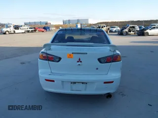 2014 Mitsubishi Lancer GT with VIN JA32U8FWXEU023081, listed as a IAAI auction lot 41609349 with 1 mi miles. Bid and sale history available at carsss.com. Image 15.