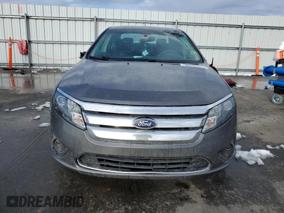 2011 Ford Fusion SE with VIN 3FAHP0HA8BR216084, listed as a Copart auction lot 50295375 with 122,062 mi miles and Salvage Title. Bid and sale history available at DreamBid. Image 5.